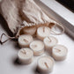 Soy Wax Tealights coming out of linen bag 